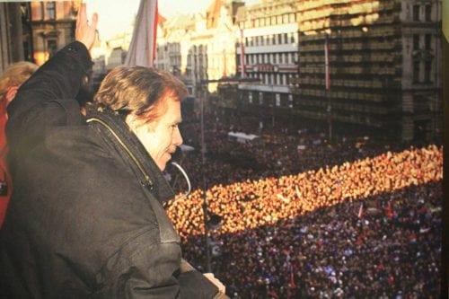 Havel waving over a crowd