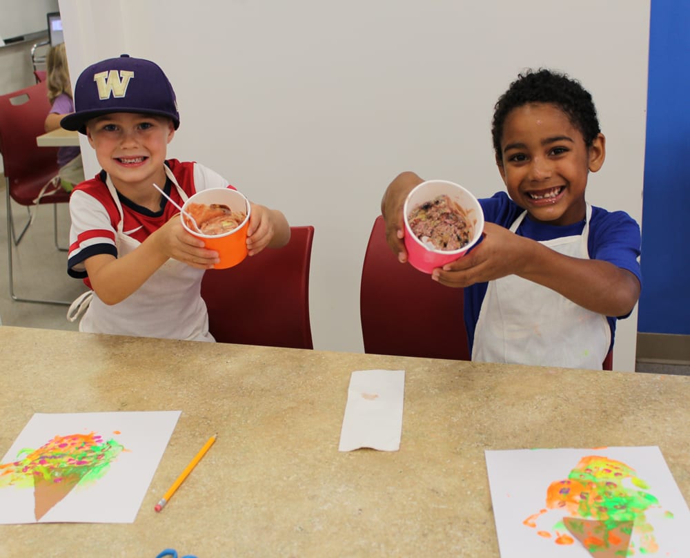 Children eating ice cream and painting
