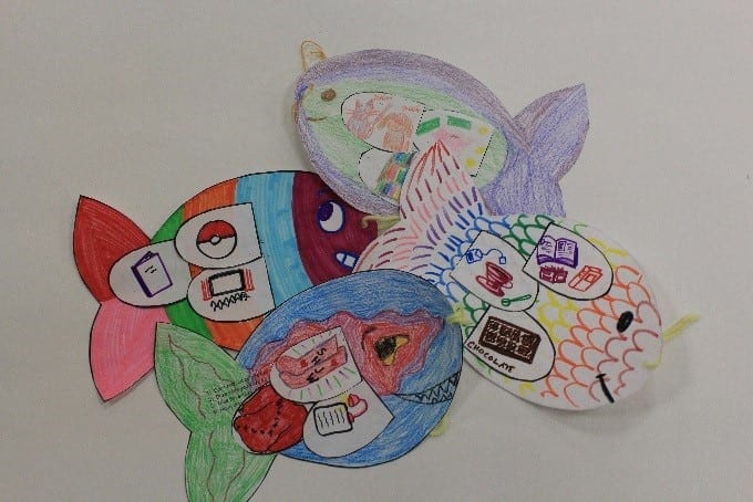Paper crafts made by children in the shape of a fish